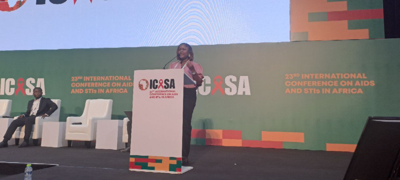 Giving an oral presentation at the International Conference on AIDS and STIs in Africa (ICASA), Accra Ghana 2025